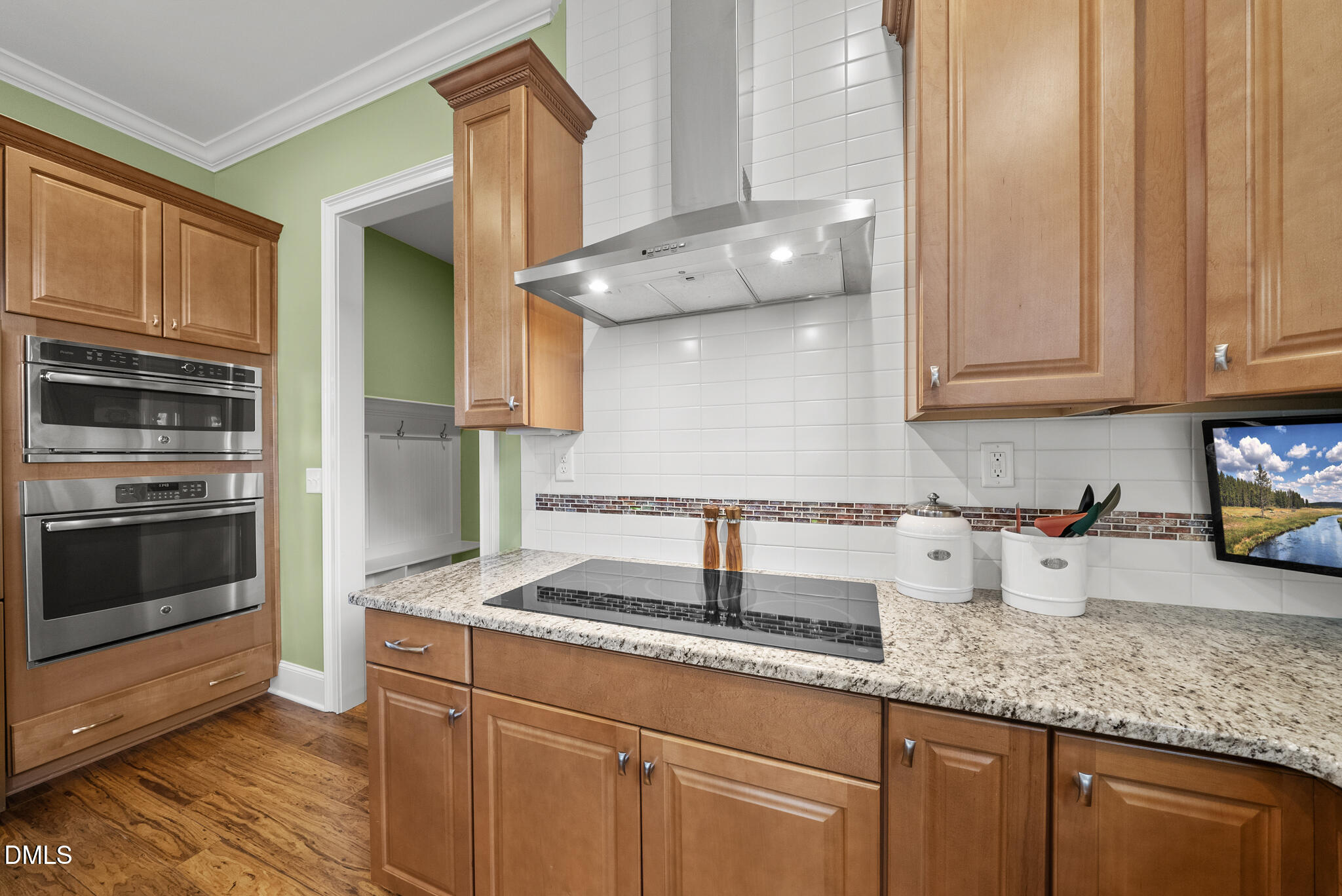 140 Restonwood Drive Apex, NC 27539 - Photo 19 of 63 Electirc cooktop with gas stuv out