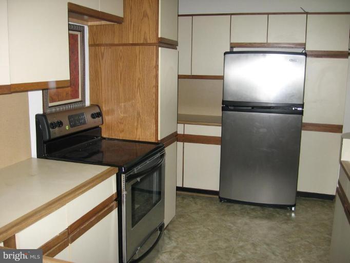 5154 Paw Paw Road Cambridge, MD 21613 - Photo 4 of 24 New SS range and Fridge