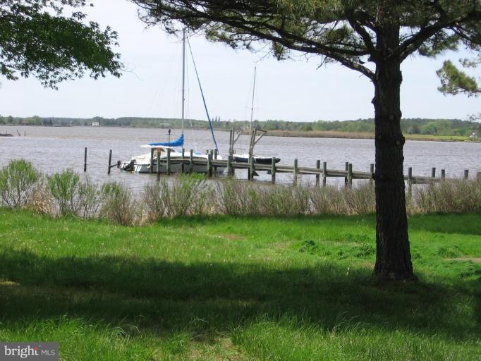 5154 Paw Paw Road Cambridge, MD 21613 - Photo 7 of 24 Neighbor's pier