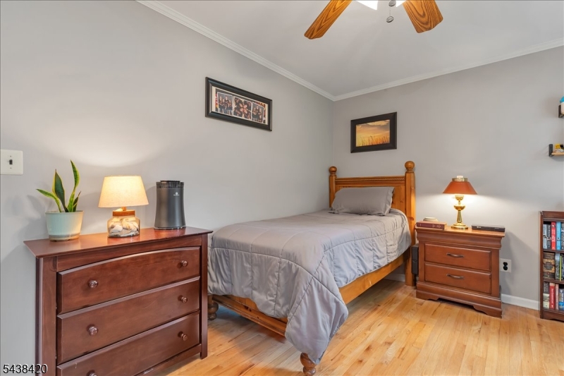 79 Main Street Califon, NJ 07830 - Photo 23 of 50 a bedroom with a bed and a dresser