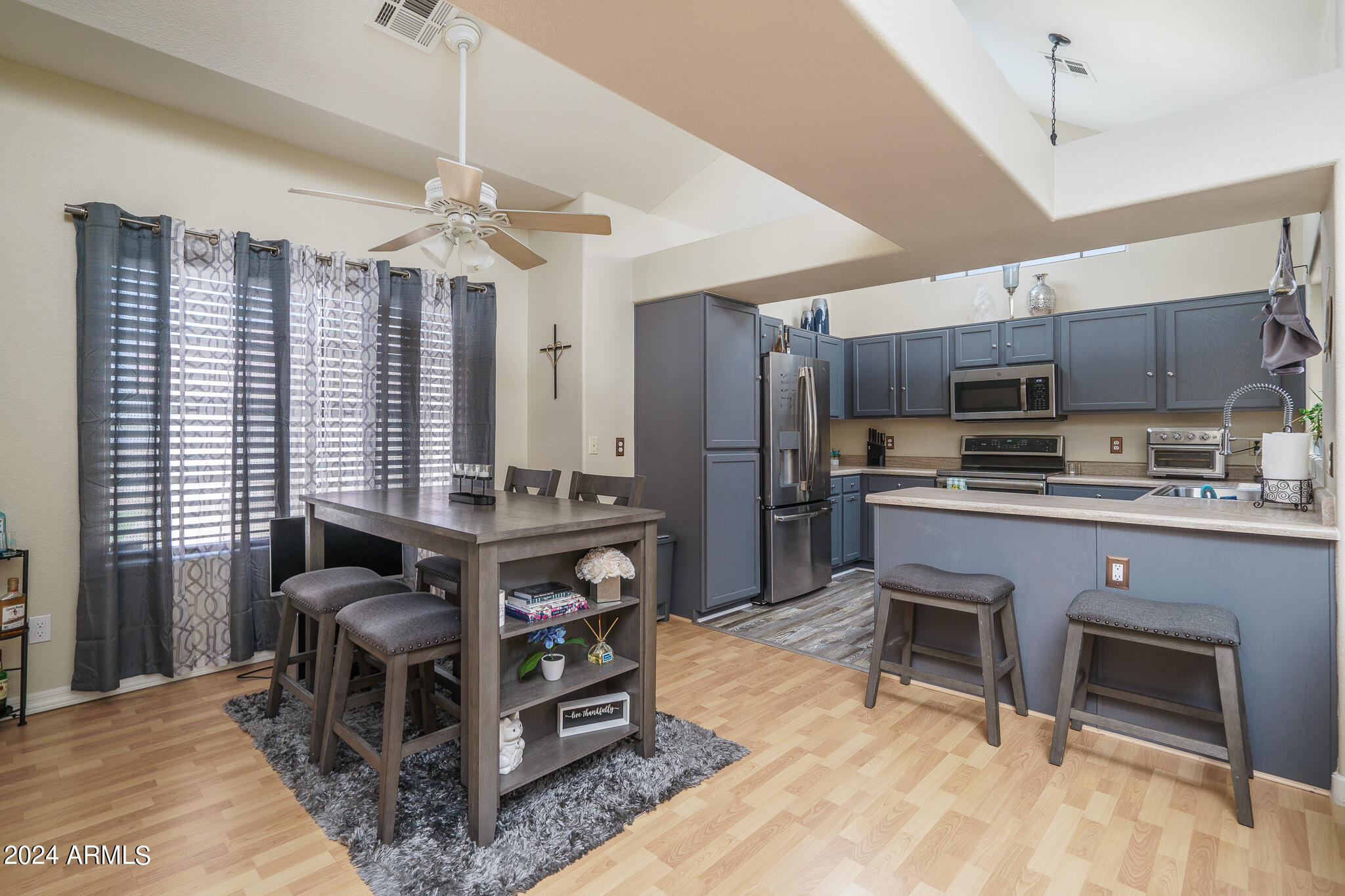 2801 North Litchfield Road, Unit 9 Goodyear, AZ 85395 - Photo 9 of 27 8) DINING TO KITCHEN