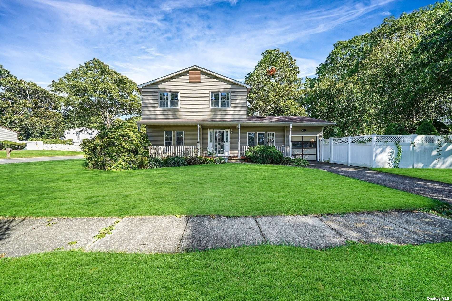 a view of outdoor space yard and front view of a house