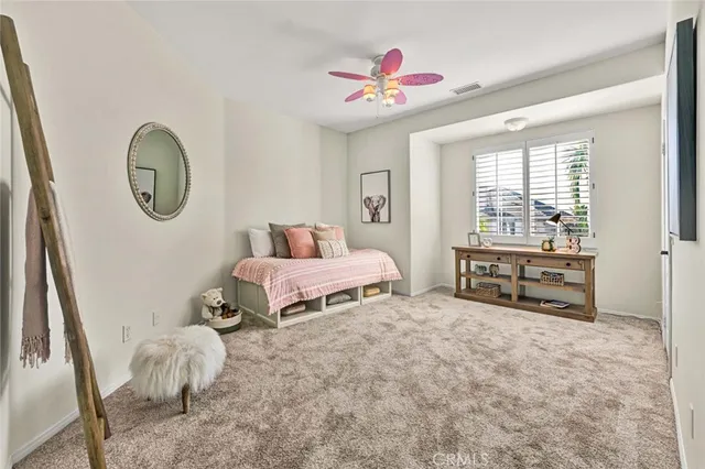 a bathroom with double sink and a mirror