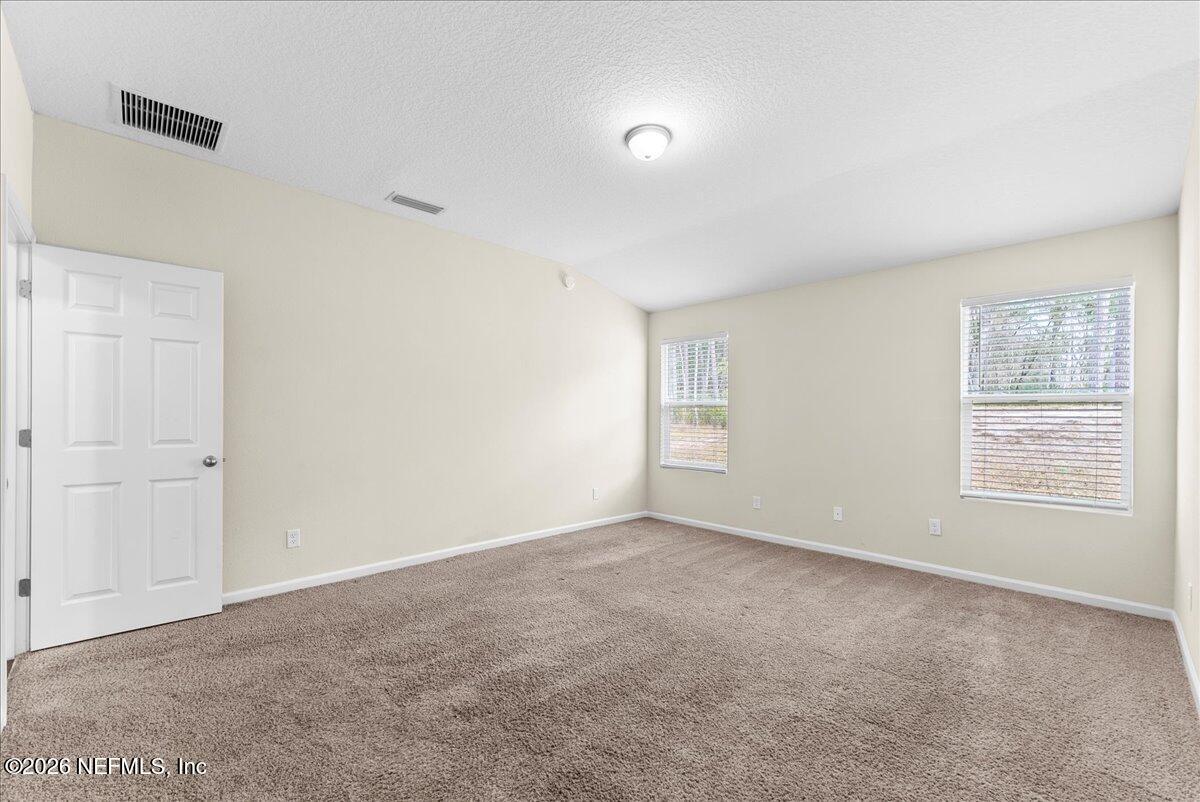2383 Daisy Street Middleburg, FL 32068 - Photo 20 of 33 a view of an empty room with a window