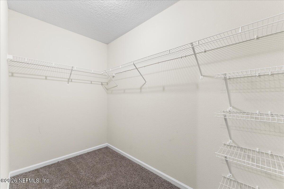 2383 Daisy Street Middleburg, FL 32068 - Photo 22 of 33 a view of a room with racks on the wall