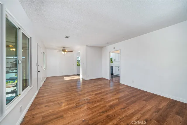 a view of an empty room and window