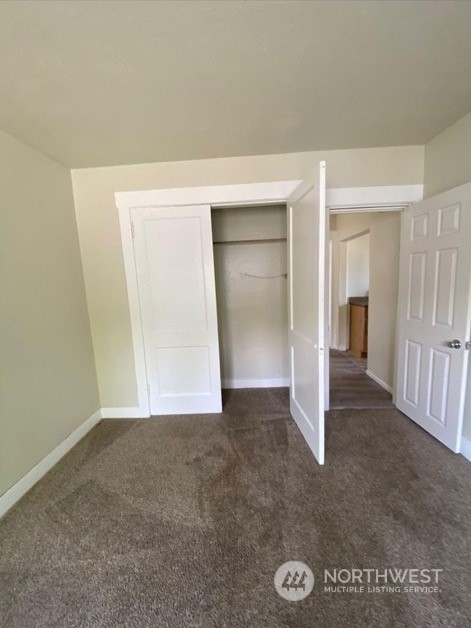 301 West 3rd Street Aberdeen, WA 98520 - Photo 13 of 15 an empty room with closet