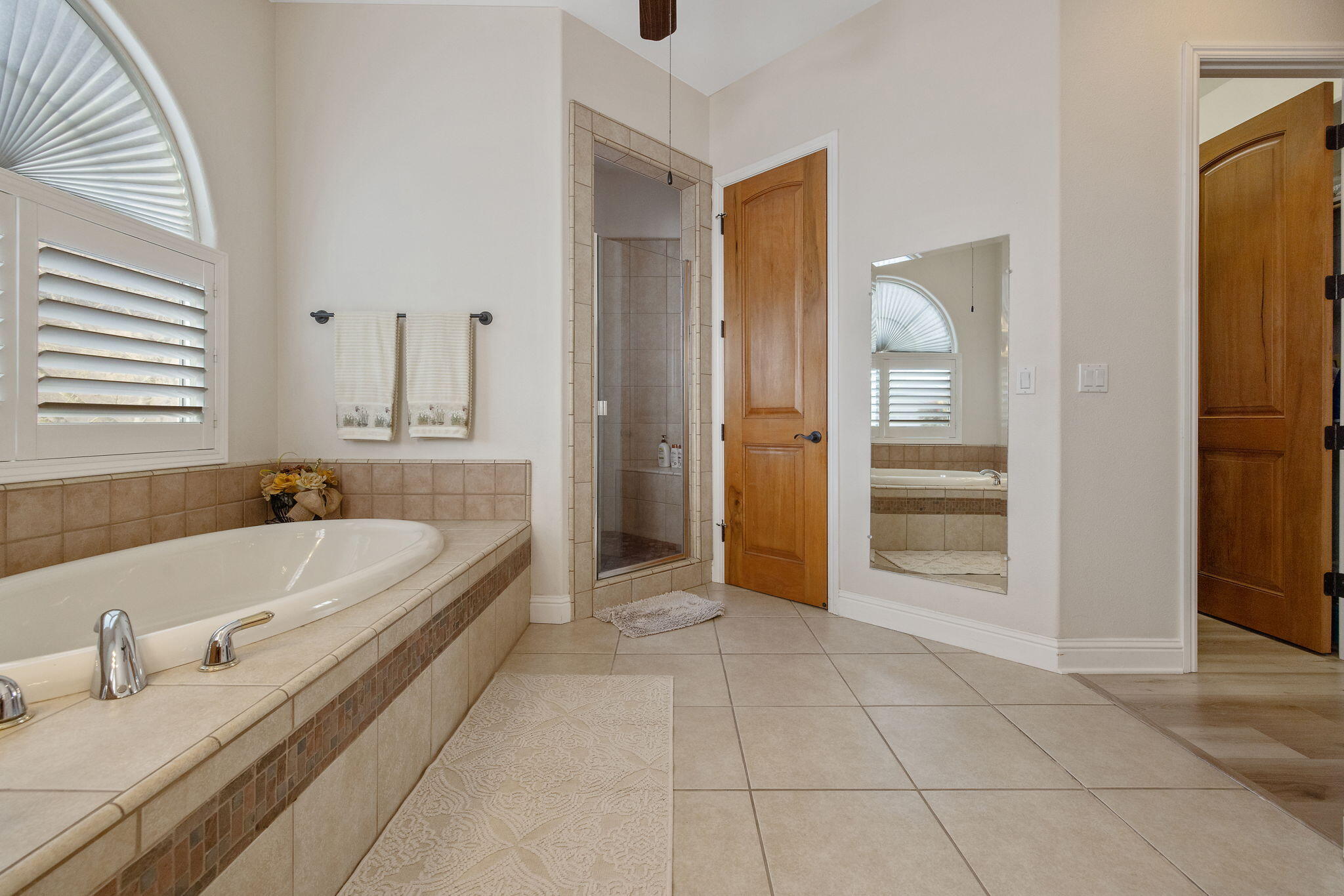 729 St Thomas Court Exeter, CA 93221 - Photo 35 of 66 a bathroom with a bathtub and a shower