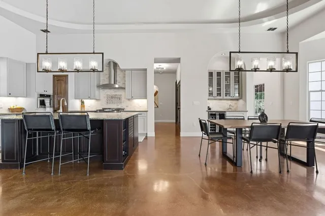 a bedroom with a bed and a fireplace