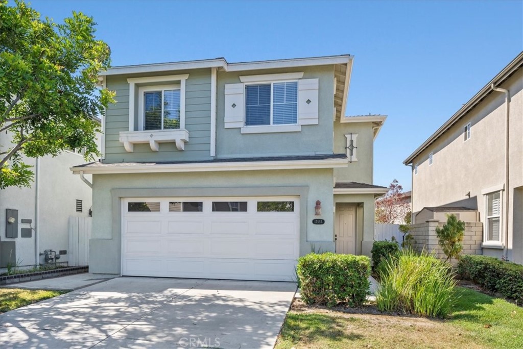 17557 Buttonwood Lane Carson, CA 90746 - Photo 1 of 43 a front view of a house with a yard