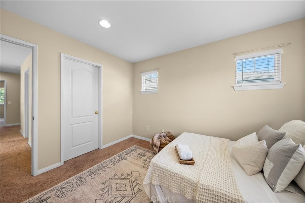 17557 Buttonwood Lane Carson, CA 90746 - Photo 18 of 43 a bedroom with a bed and wooden floor
