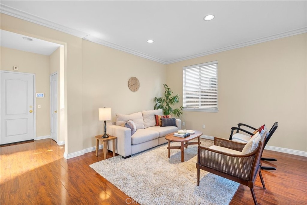 17557 Buttonwood Lane Carson, CA 90746 - Photo 4 of 43 a living room with furniture and wooden floor