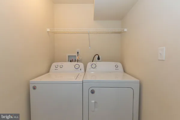 a view of a hallway with closet