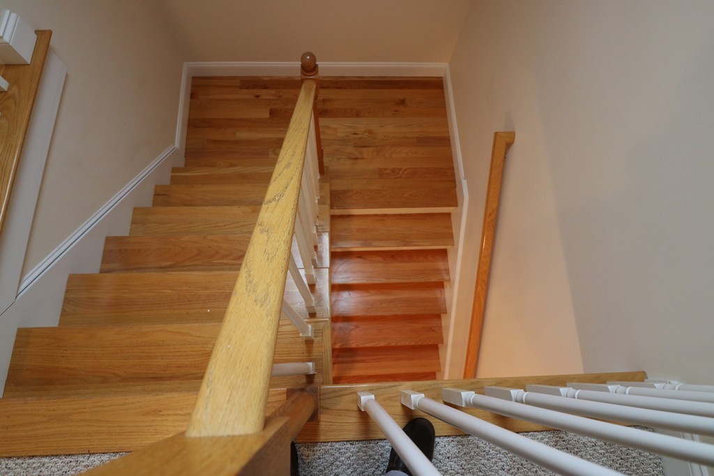 68 Brookfield Road, Unit 202 Charlton, MA 01507 - Photo 6 of 13 a view of entryway with wooden floor