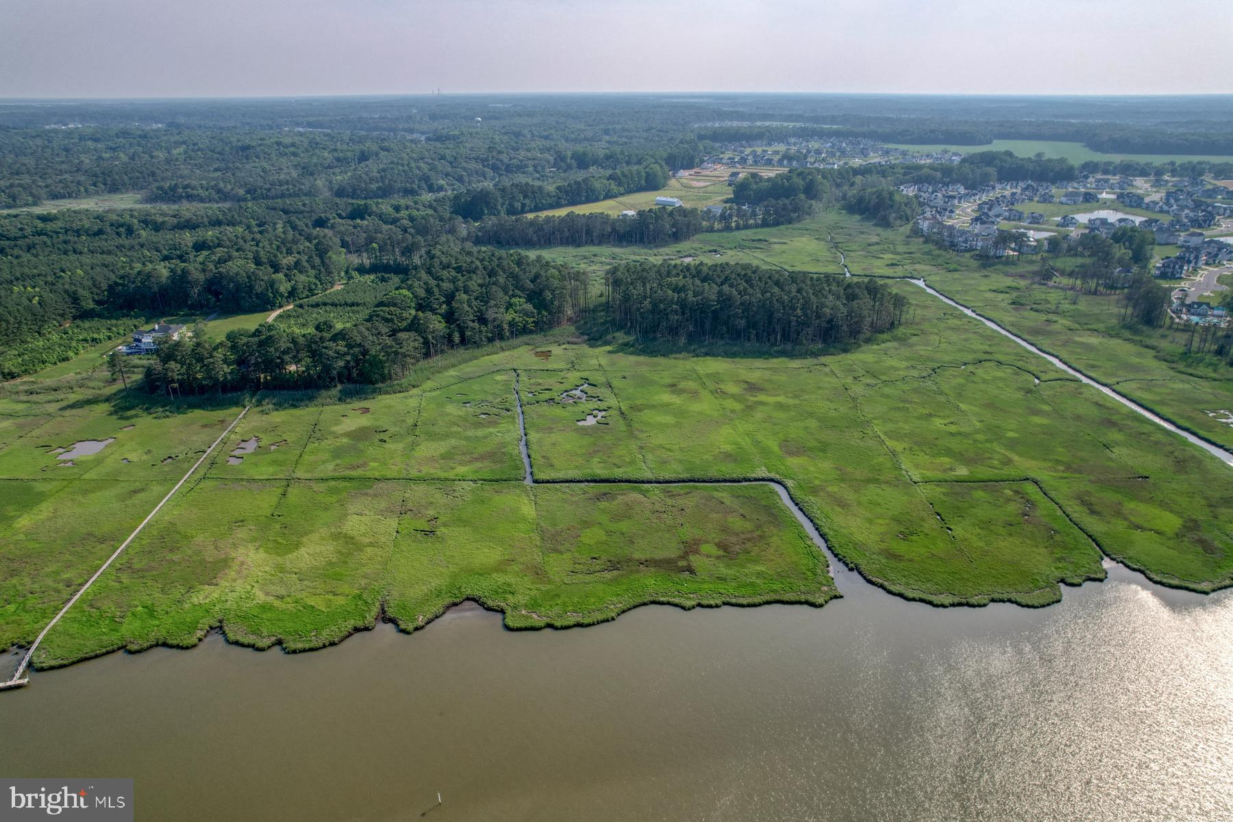 22253 Waterview Road, Unit 4 Lewes, DE 19958 - Photo 25 of 28 a view of a tennis court