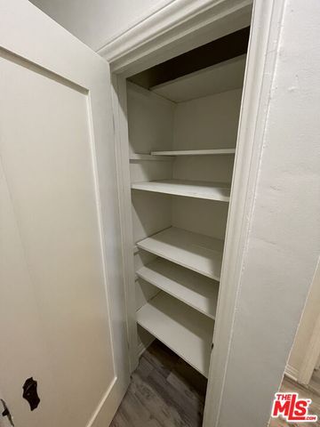 a storage room with washer and dryer