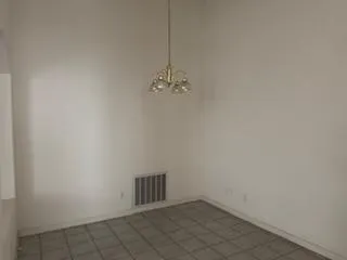 a kitchen with stainless steel appliances granite countertop a refrigerator stove top oven and sink