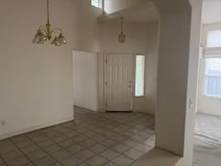 a kitchen with a refrigerator stove and microwave
