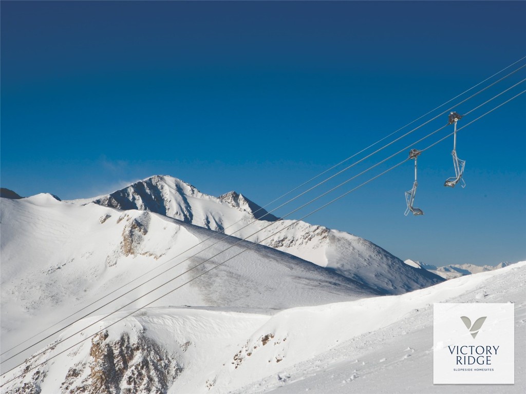 7 Legacy Way Breckenridge, CO 80424 - Photo 7 of 12 a view of a bedroom with a bed