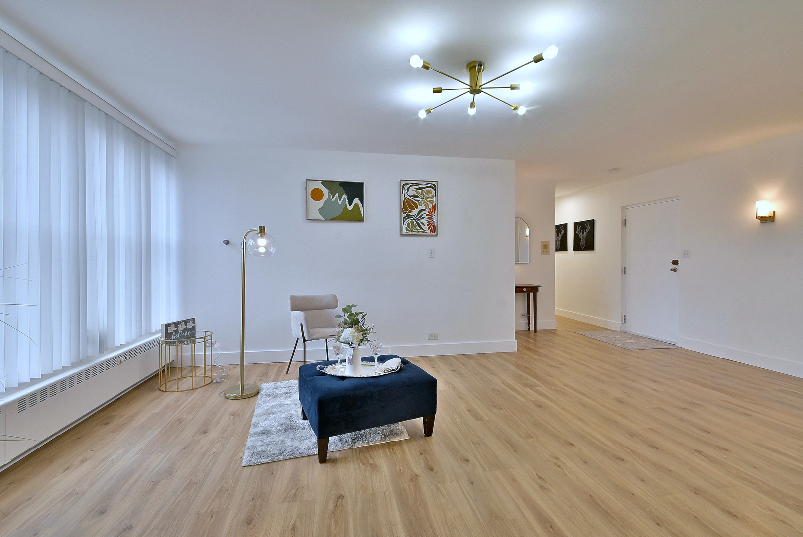 1301 West Touhy Avenue, Unit 315 Park Ridge, IL 60068 - Photo 10 of 17 a living room with furniture and a wooden floor