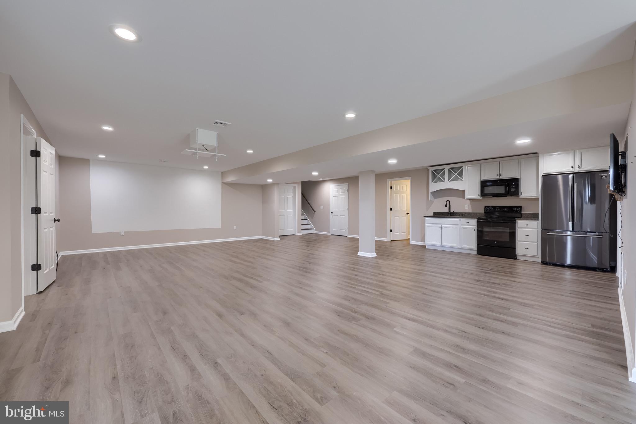95 Hunters Chase Etters, PA 17319 - Photo 13 of 73 a view of kitchen with refrigerator stove and wooden cabinets