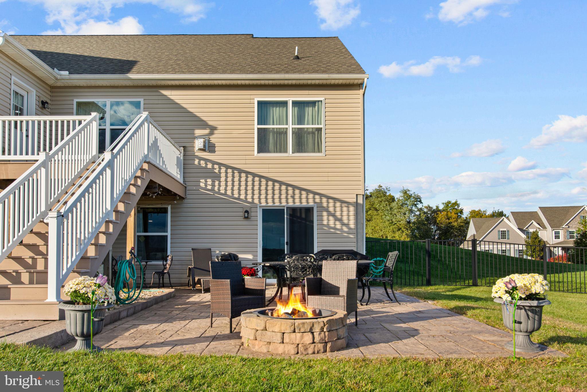 95 Hunters Chase Etters, PA 17319 - Photo 2 of 73 a view of a patio with table and chairs with wooden fence