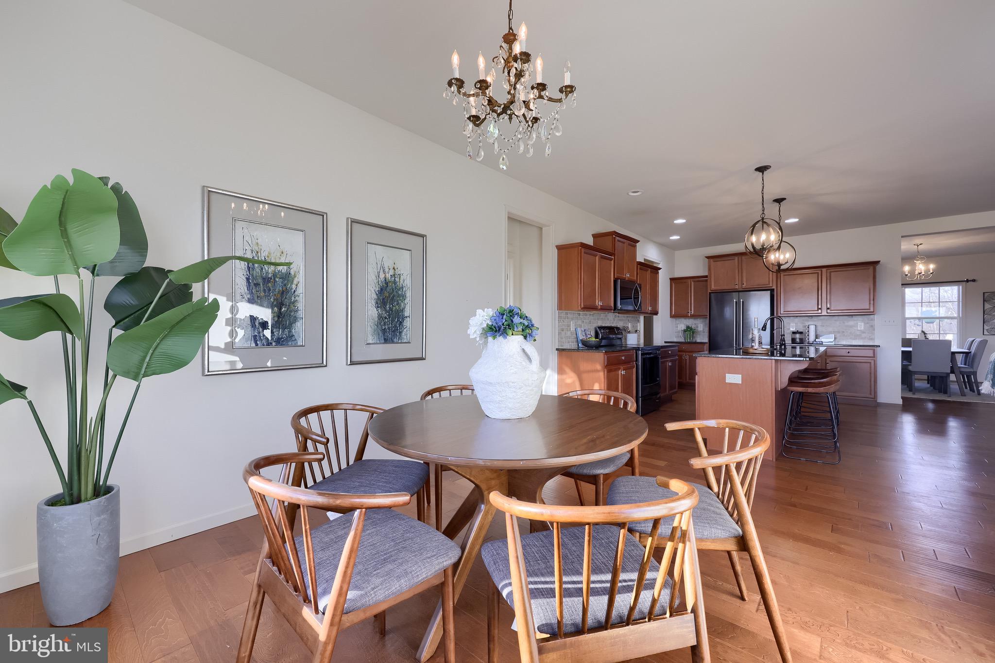95 Hunters Chase Etters, PA 17319 - Photo 26 of 73 a view of a dining room with furniture window and wooden floor
