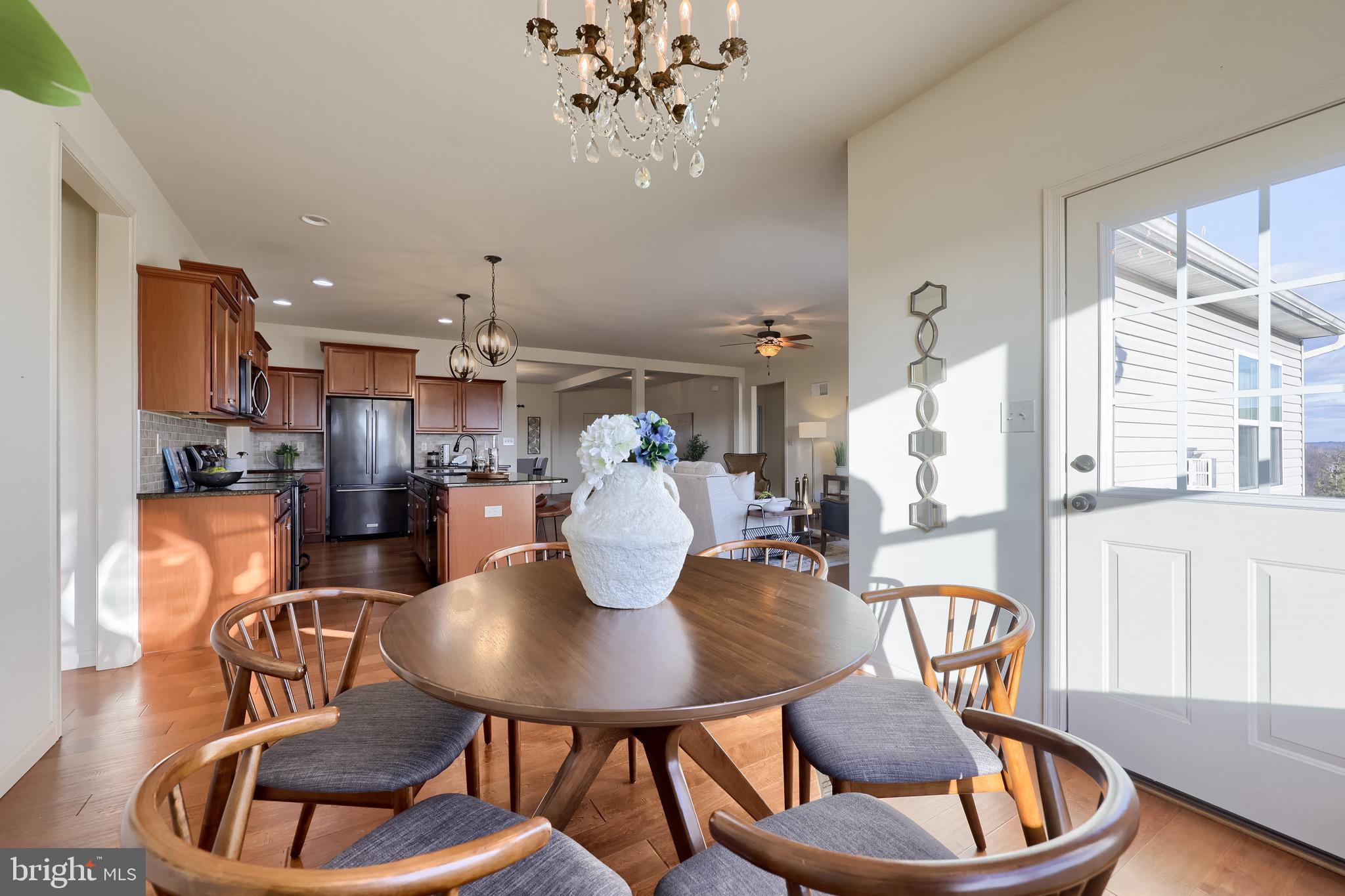 95 Hunters Chase Etters, PA 17319 - Photo 27 of 73 a dining room with furniture a rug and wooden floor
