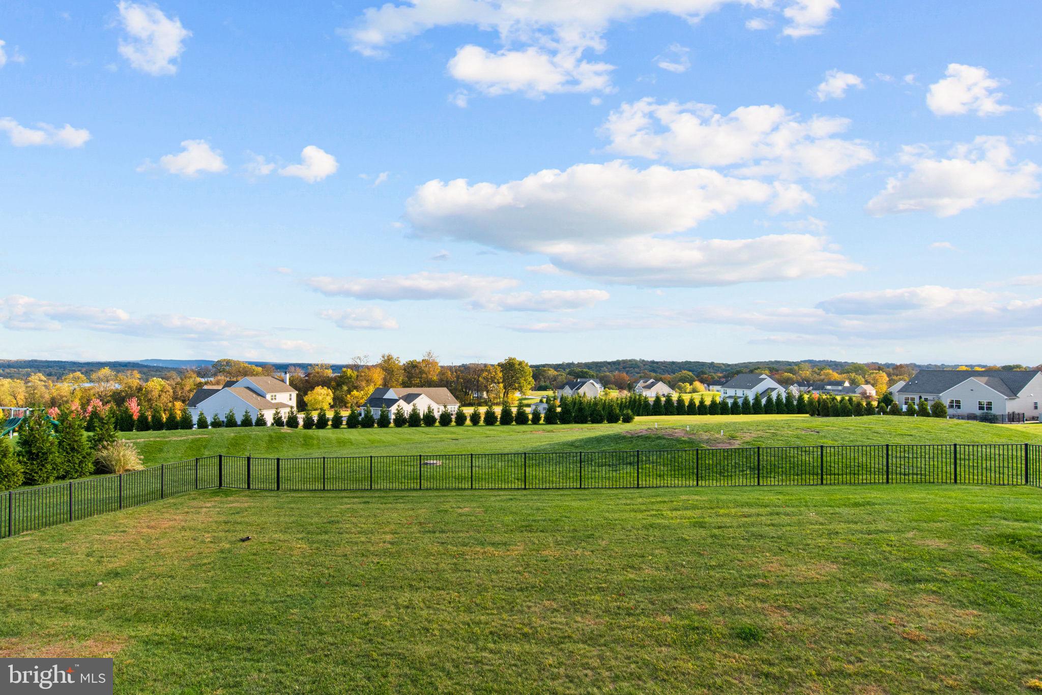 95 Hunters Chase Etters, PA 17319 - Photo 3 of 73 a view of a golf course with a lake