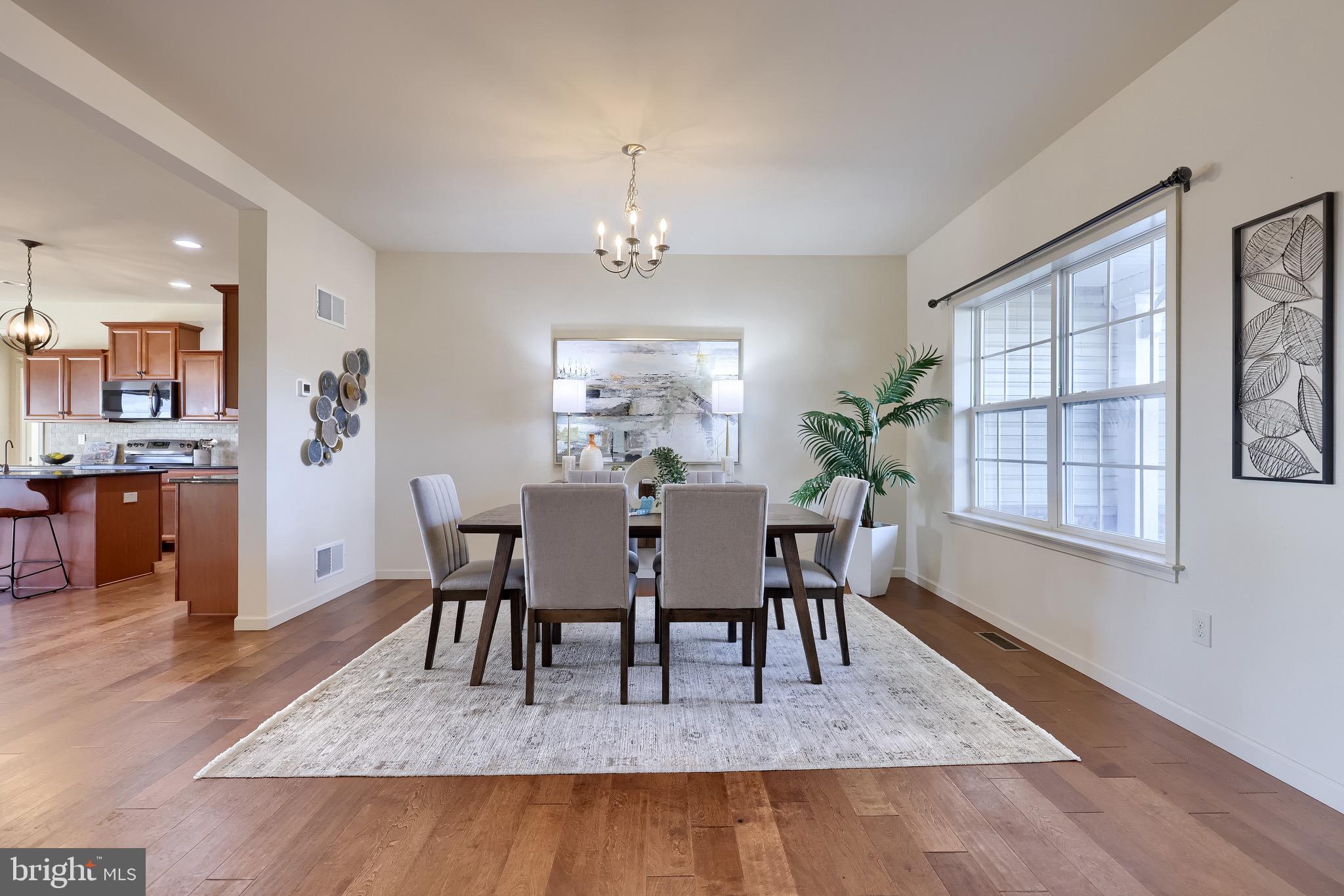 95 Hunters Chase Etters, PA 17319 - Photo 60 of 73 a view of a dining room with furniture window and wooden floor