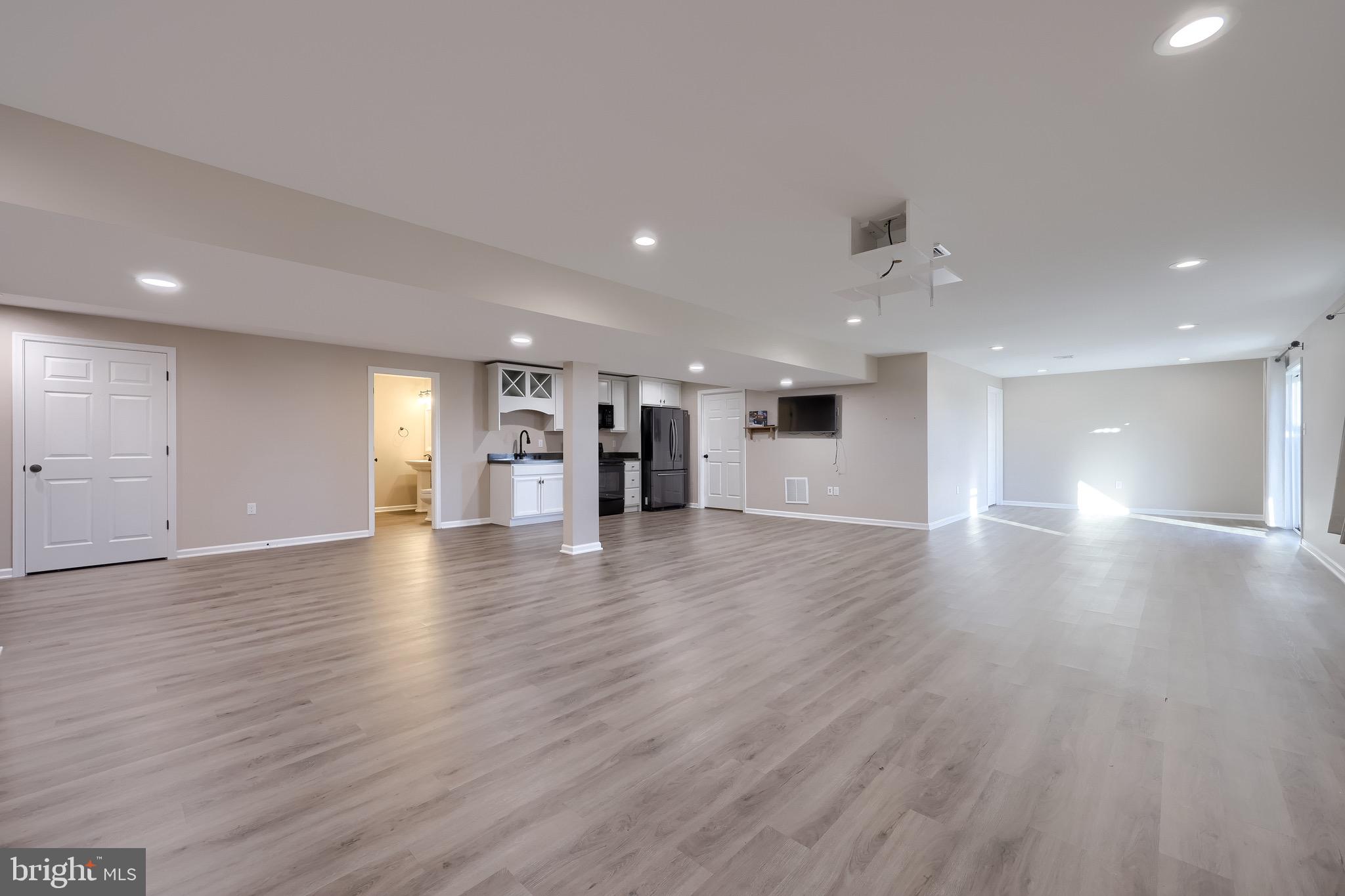 95 Hunters Chase Etters, PA 17319 - Photo 10 of 73 a view of an empty room and wooden floor