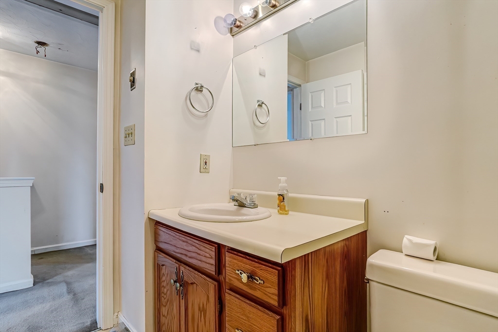 67 Providence Road, Unit 1 Grafton, MA 01519 - Photo 13 of 23 a bathroom with a sink and a mirror