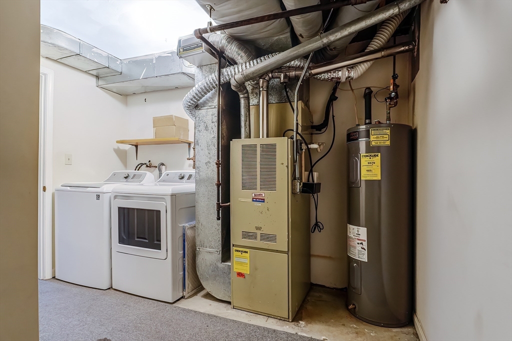 67 Providence Road, Unit 1 Grafton, MA 01519 - Photo 19 of 23 a utility room with dryer and washer