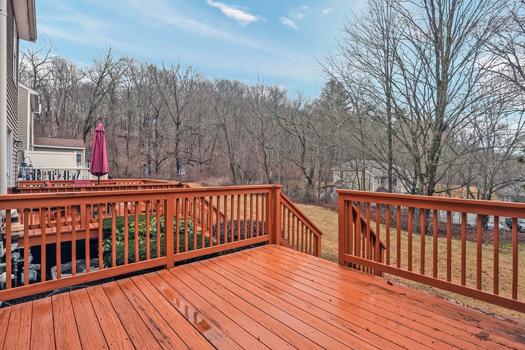 67 Providence Road, Unit 1 Grafton, MA 01519 - Photo 21 of 23 a view of wooden deck
