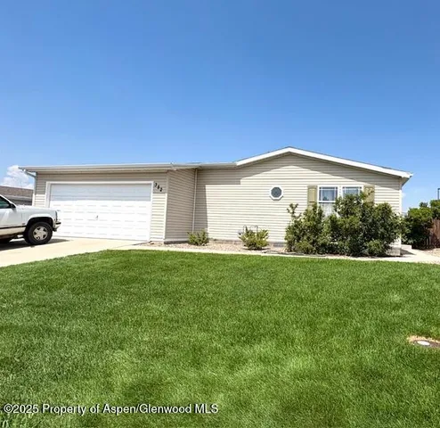 a view of a back yard of the house