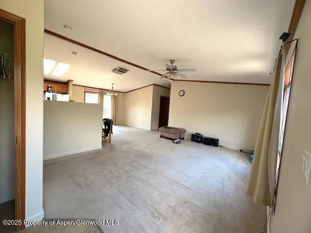 a view of a livingroom with a staircase