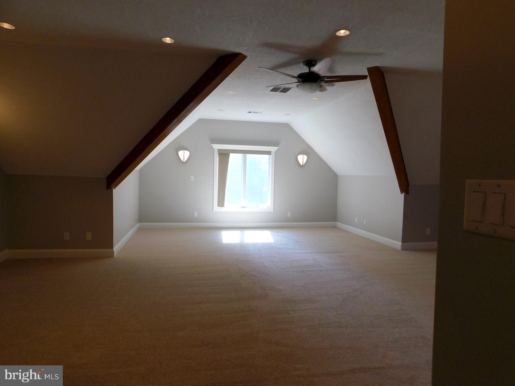 487 Brookfield Drive Dover, DE 19901 - Photo 3 of 45 wooden floor in an empty room with a window