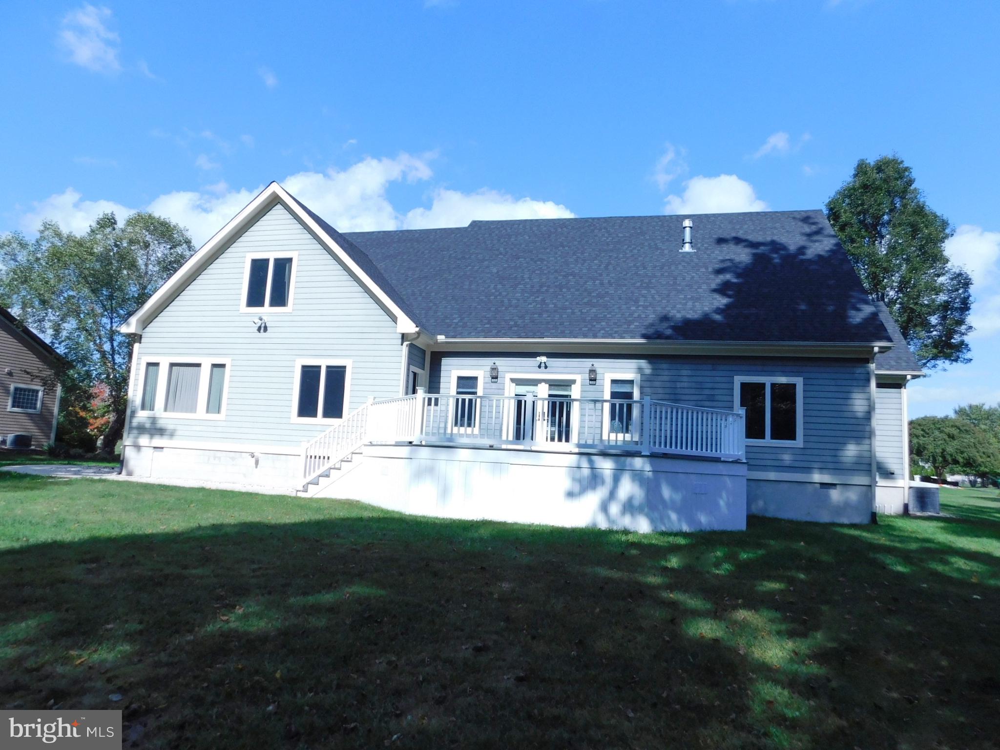 487 Brookfield Drive Dover, DE 19901 - Photo 43 of 45 a front view of a house with a yard