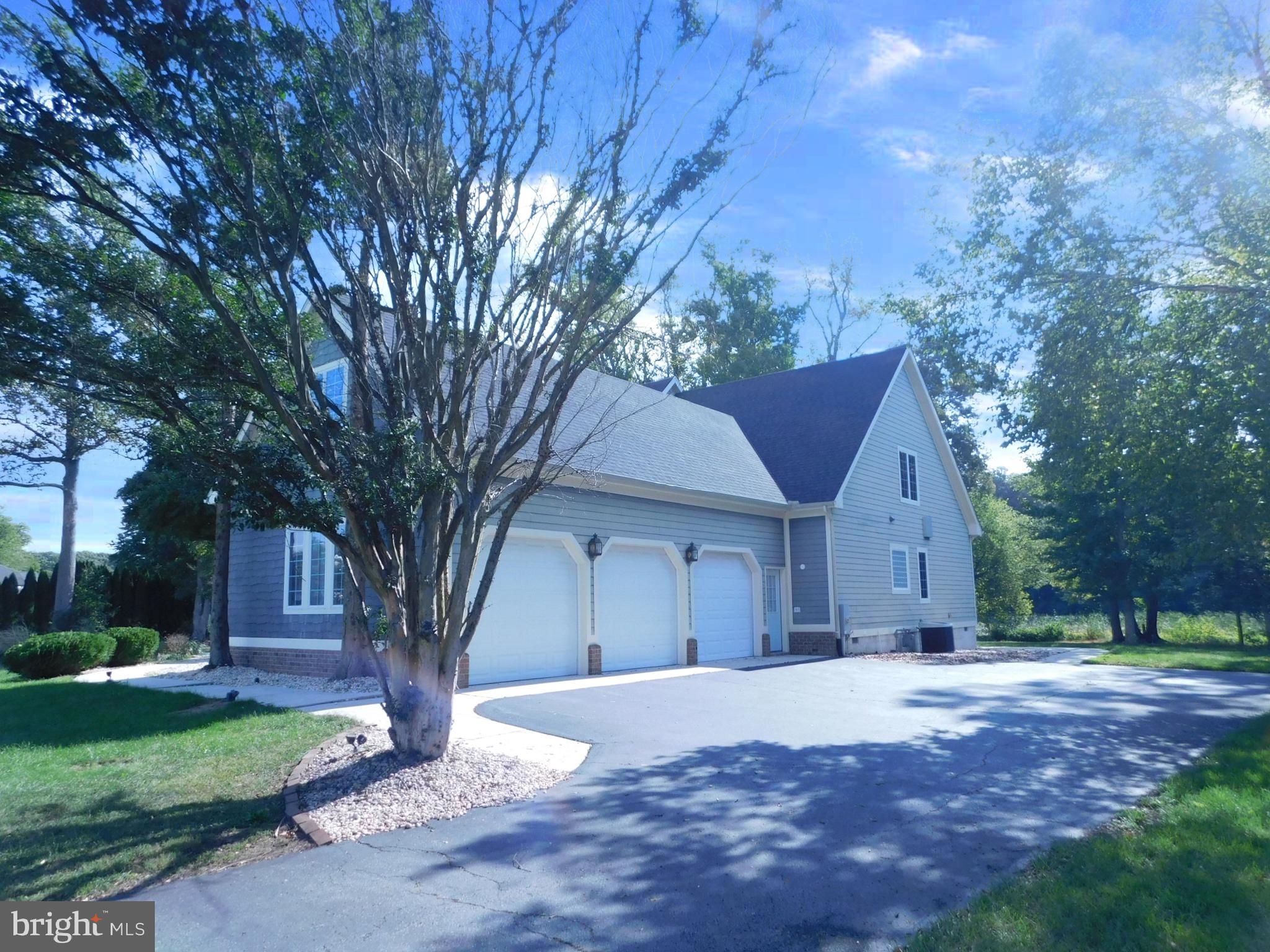 487 Brookfield Drive Dover, DE 19901 - Photo 45 of 45 a front view of a house with a yard and garage