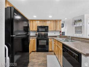 407 South Vasels Road, Unit 49 Brian Head, UT 84719 - Photo 15 of 40 Kitchen with black appliances, recessed lighting, and a peninsula
