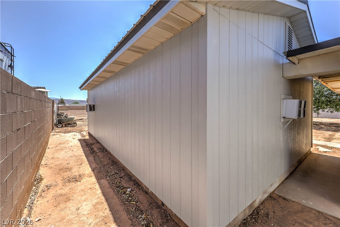 348 Tres Palomas Street Overton, NV 89040 - Photo 36 of 41 A well-maintained side exterior provides practical access and a neat appearance.
