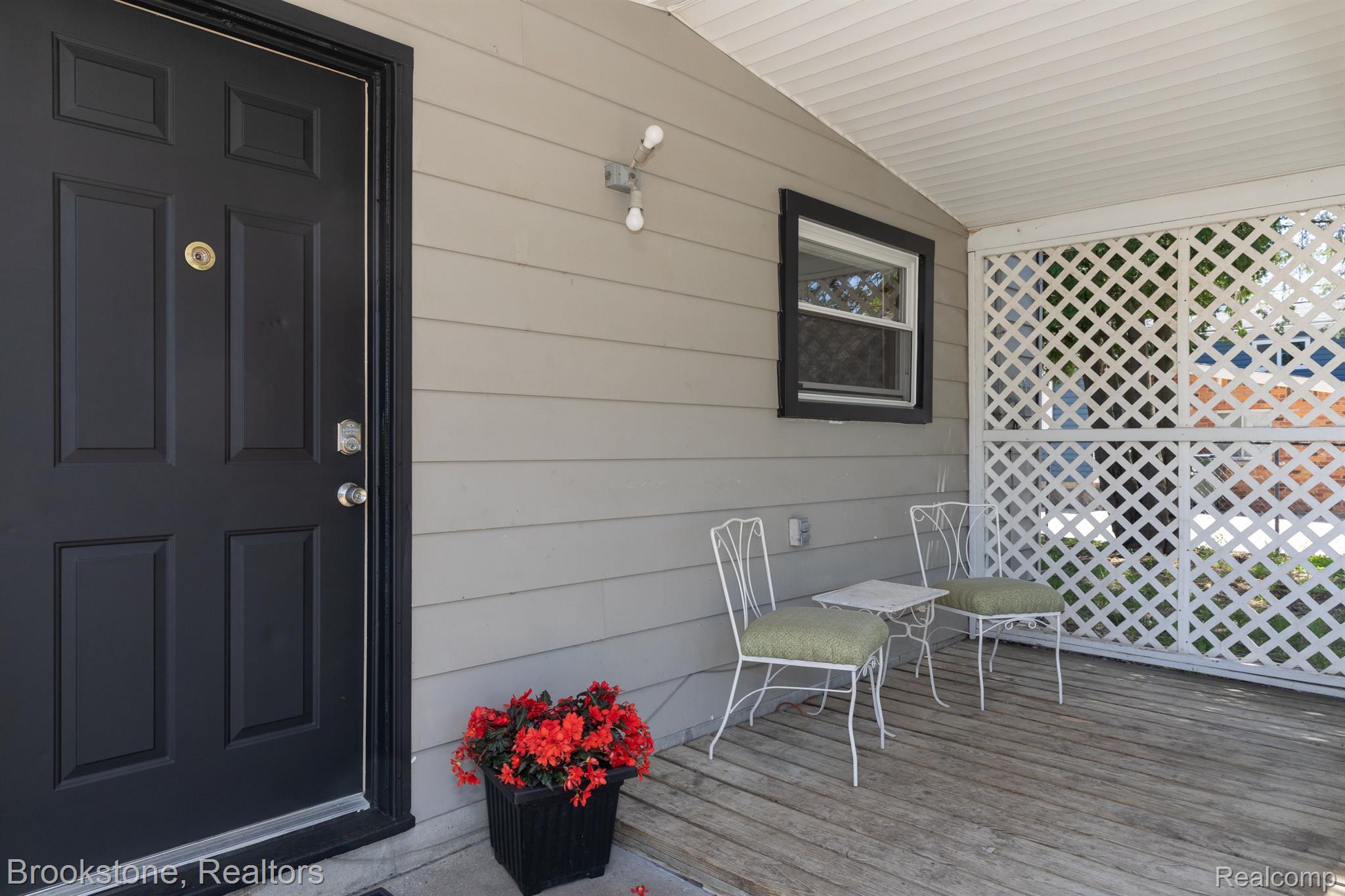 798 Pine Tree Road Lake Orion, MI 48362 - Photo 3 of 23 Your rear covered porch will be a happy place