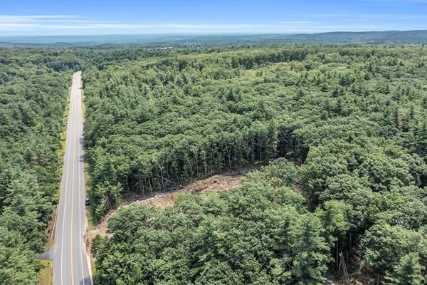 Lot 3 West State Road Ashby, MA 01431 - Photo 5 of 14 a view of a city with lush green forest