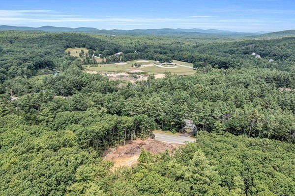 Lot 3 West State Road Ashby, MA 01431 - Photo 7 of 14 a view of a city with lush green forest