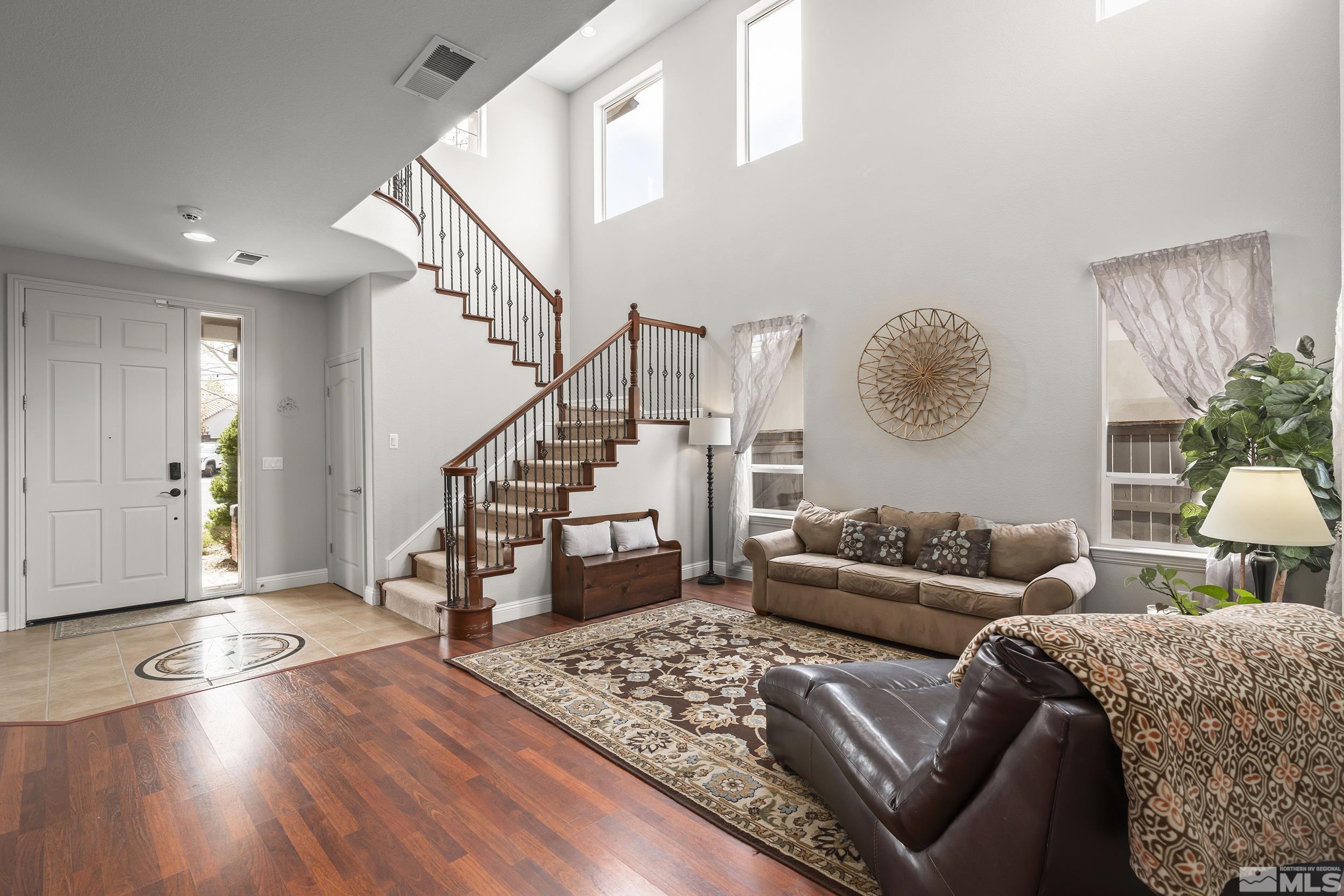 641 Aberdeen Court Reno, NV 89521 - Photo 3 of 39 a living room with furniture and wooden floor