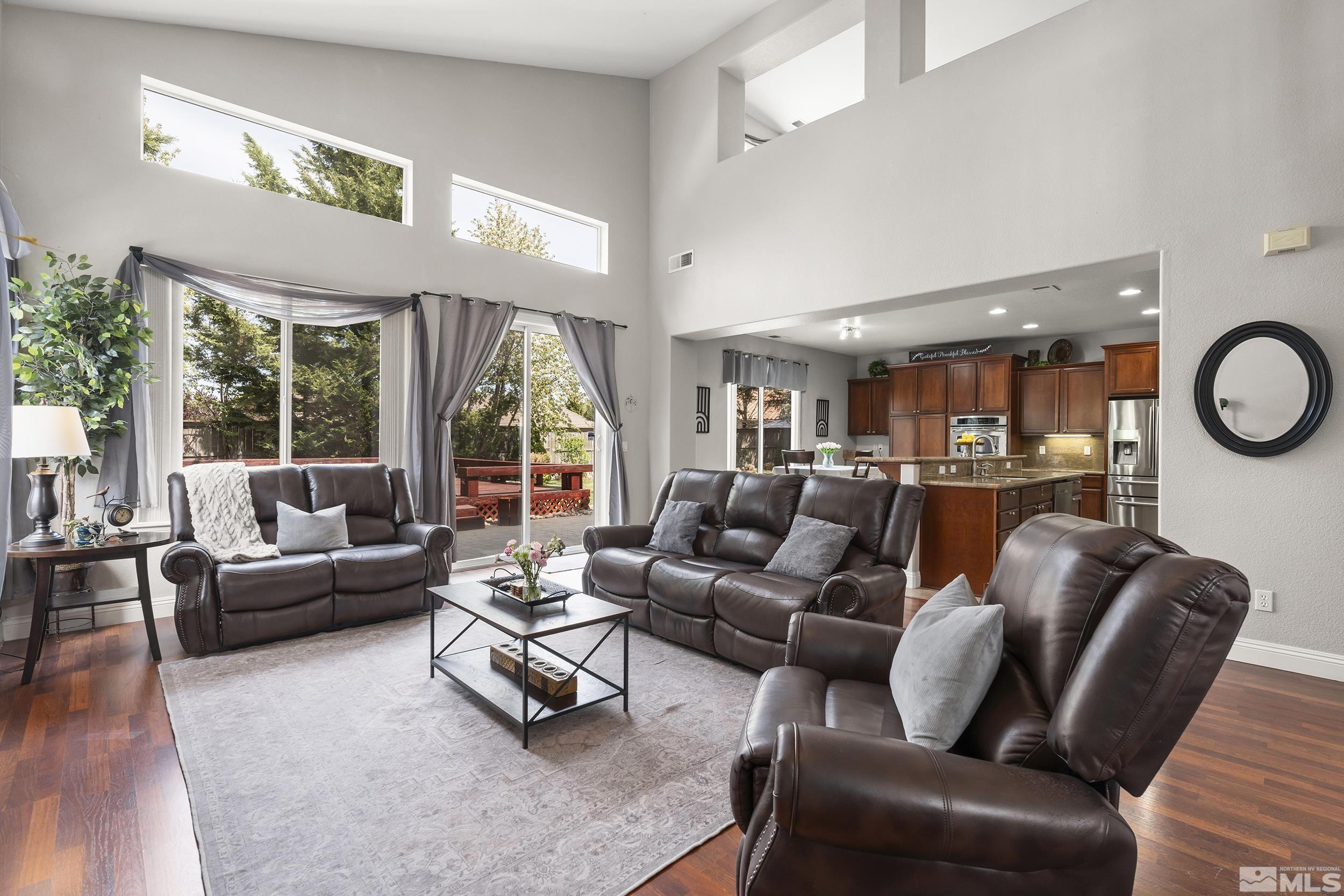 641 Aberdeen Court Reno, NV 89521 - Photo 5 of 39 a living room with furniture and a large window