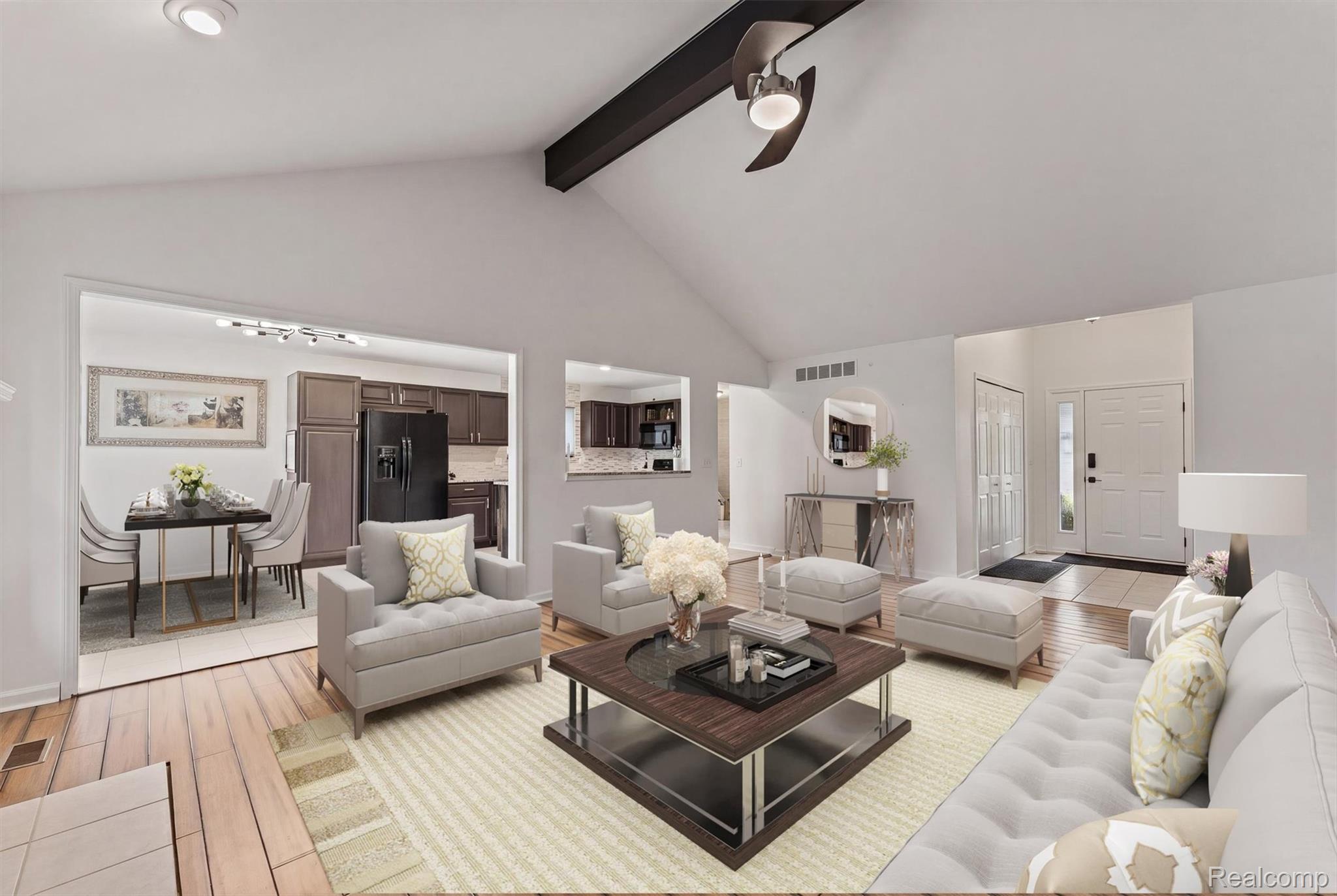 29213 Rachid Lane New Baltimore, MI 48047 - Photo 6 of 26 Vaulted ceiling with an exposed beam and ceiling fan