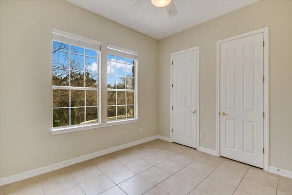 an empty room with windows