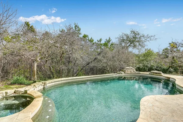 a view of a lake with a yard
