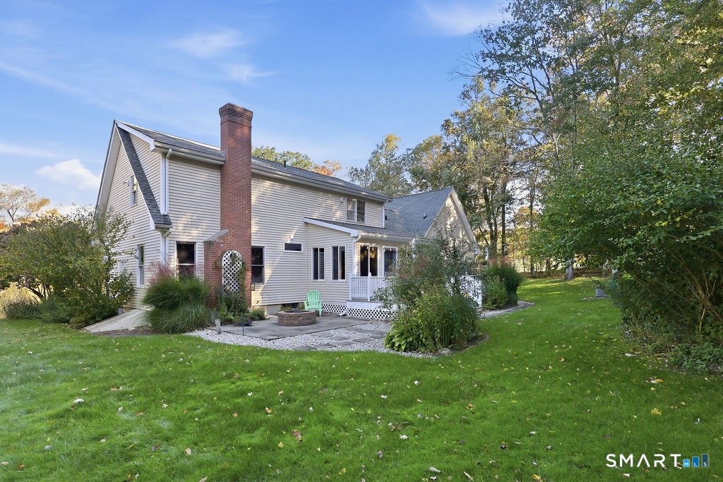 THE PATIO, FIRE PIT, DECK AND 3 SEASON ROOM